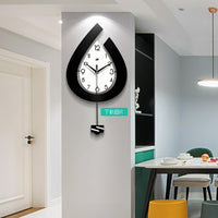 Horloge murale moderne Garvee, à piles, en forme de goutte d'eau, pour salon, chambre, cuisine, bureau, 39 x 73 cm, élégante