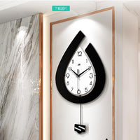 Horloge murale moderne Garvee, à piles, en forme de goutte d'eau, pour salon, chambre, cuisine, bureau, 39 x 73 cm, élégante