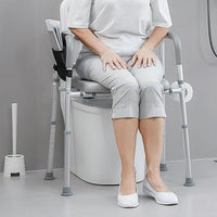 Siège de toilette surélevé Garvee avec accoudoirs, réglable en largeur et en hauteur, rembourré, cadre en aluminium, antidérapant, pour seniors, porte-papier toilette inclus