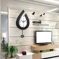 Horloge murale moderne Garvee, à piles, en forme de goutte d'eau, pour salon, chambre, cuisine, bureau, 39 x 73 cm, élégante