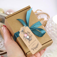 GARVEE Coffret de 60 porte-clés pendentif ange gardien avec pochette en organza et cartes kraft, idéal pour les cadeaux de mariage, d'anniversaire et de naissance.