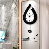 Horloge murale moderne Garvee, à piles, en forme de goutte d'eau, pour salon, chambre, cuisine, bureau, 39 x 73 cm, élégante