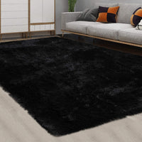 Tapis moelleux Garvee 4 cm en polyester peluche noir pour salon et chambre d'enfant. Extra doux et antidérapant.