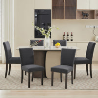 Ensemble de 2 chaises de salle à manger Garvee, revêtues de tissu et décorées de clous décoratifs. Ergonomiques et robustes, elles sont en bois d'hévéa gris foncé et conviennent aussi bien à la salle à manger qu'au salon.