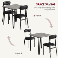Ensemble table et chaises Garvee pour 2 personnes, avec chaises rembourrées, MDF et métal, compact pour petits espaces, gris vintage et noir.