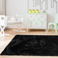 Tapis rond moelleux Garvee 100 cm (3'3,3") en velours noir doux et shaggy, antidérapant, idéal pour la chambre d'enfant, le salon ou la chambre à coucher.