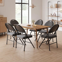 Ensemble de 4 chaises pliantes Garvee avec assises rembourrées, revêtement en coton et lin, structure métallique robuste, pliables et confortables pour la cuisine et le bureau.