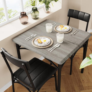 Ensemble table et chaises Garvee pour 2 personnes, gris rustique, MDF et acier, gain de place, idéal pour les petites pièces et les appartements.