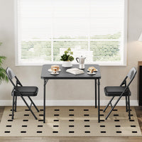Table pliante Garvee 85,3 cm (33,6 pouces) avec coussin en PU, cadre en métal et pieds antidérapants, idéale pour le bureau et le camping. Couleur : noir. Portable.