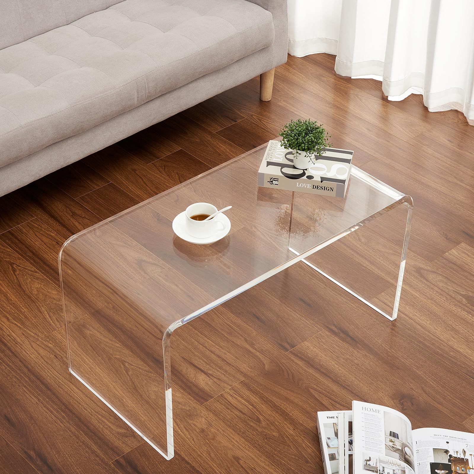 Table basse Garvee en acrylique transparent en forme de U, 81 x 40 x 42 cm, idéale pour salon ou terrasse.