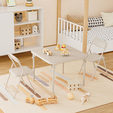 Ensemble table et chaises pliantes Garvee pour enfants avec coussin d'assise en PU, structure robuste en acier, pliable, idéal pour manger, lire et jouer, compact et confortable.