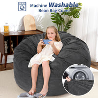 Pouf Garvee grand modèle en velours côtelé, housse pliable et lavable 2 en 1, gris foncé, pour salon ou chambre.