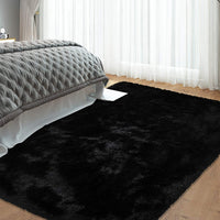 Tapis moelleux Garvee 4 cm en polyester peluche noir pour salon et chambre d'enfant. Extra doux et antidérapant.