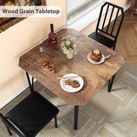 Ensemble table et chaises Garvee pour 2 personnes, design biseauté, chaises rembourrées en PU, structure en MDF et acier, compact, idéal pour les petits espaces, 111 x 70 x 78 cm, noir