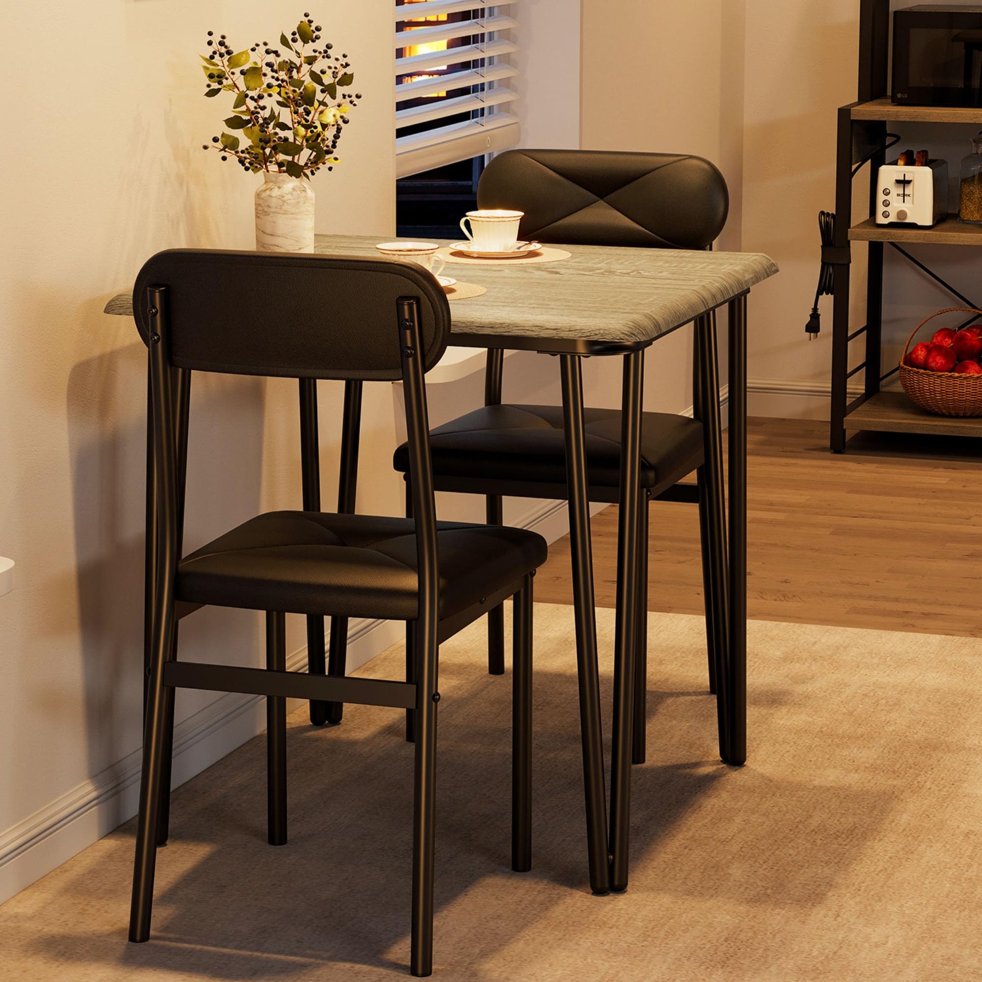Ensemble table et chaises Garvee pour 2 personnes, avec chaises rembourrées, MDF et métal, compact pour petits espaces, gris vintage et noir.