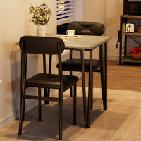Ensemble table et chaises Garvee pour 2 personnes, avec chaises rembourrées, MDF et métal, compact pour petits espaces, gris vintage et noir.