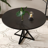 Table de salle à manger ronde Garvee de 119 cm (47 pouces) avec piètement en métal, idéale pour la cuisine et la salle à manger. Plateau en MDF résistant aux rayures et antidérapant, pouvant accueillir 4 à 6 personnes.