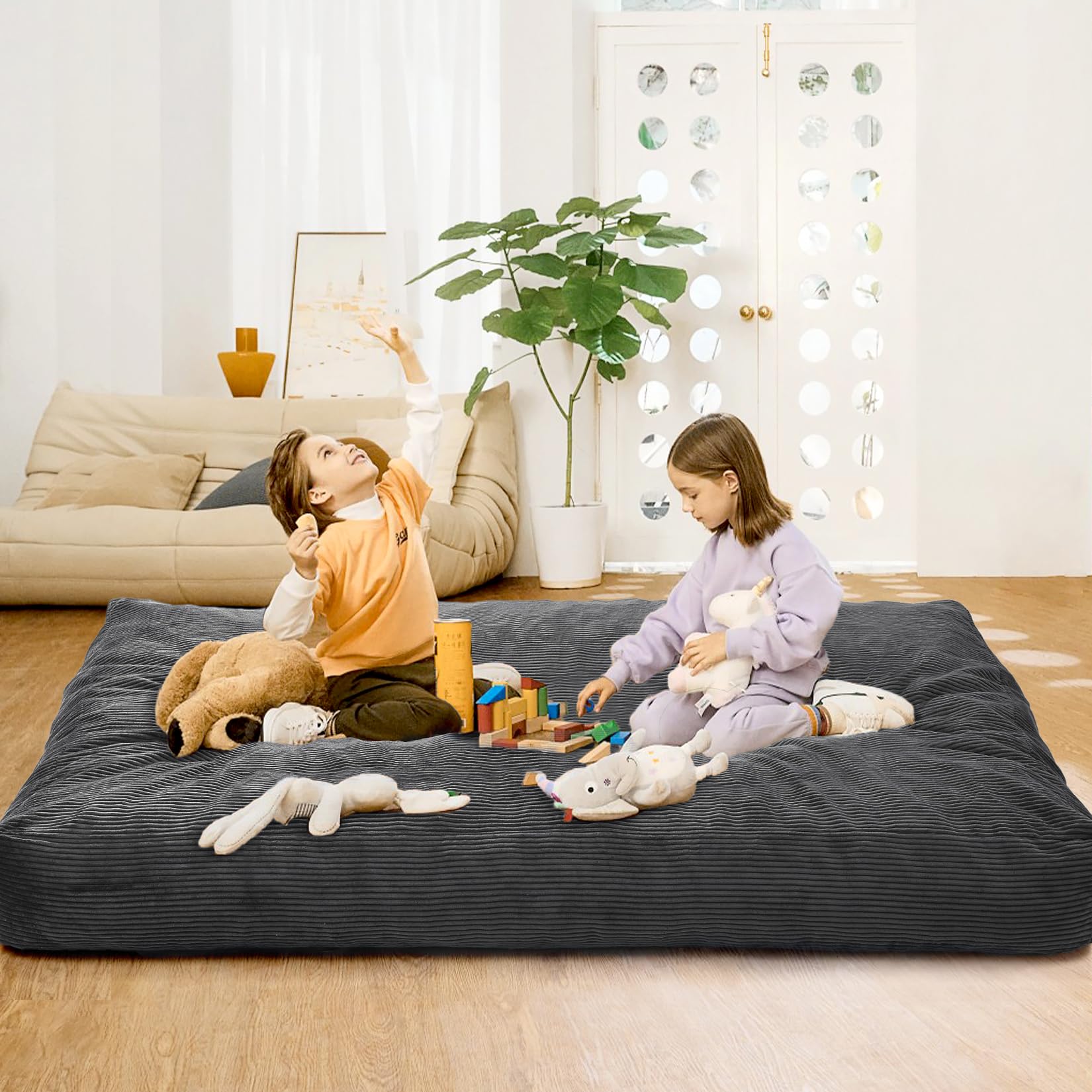Pouf Garvee grand modèle en velours côtelé, housse pliable et lavable 2 en 1, gris foncé, pour salon ou chambre.
