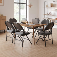Ensemble de 4 chaises pliantes Garvee avec assises rembourrées, revêtement en coton et lin, structure métallique robuste, pliables et confortables pour la cuisine et le bureau.