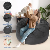 Pouf Garvee grand modèle en velours côtelé, housse pliable et lavable 2 en 1, gris foncé, pour salon ou chambre.