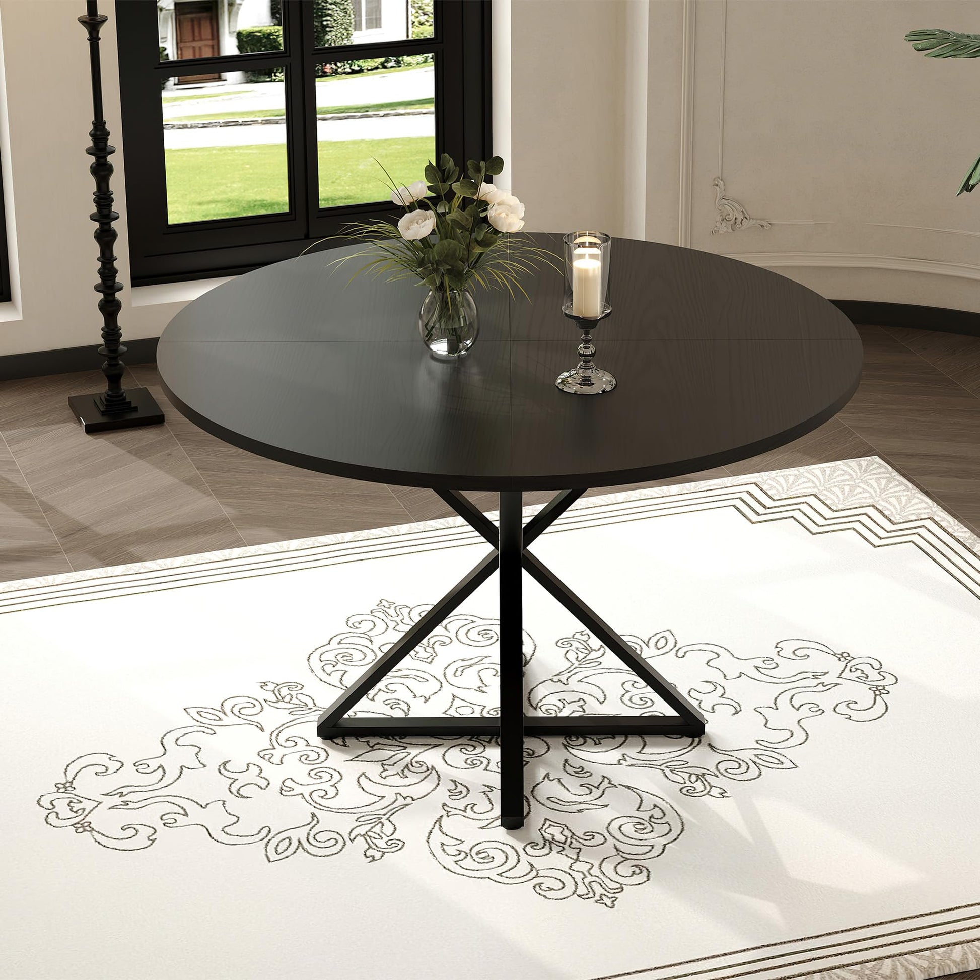 Table de salle à manger ronde Garvee de 119 cm (47 pouces) avec piètement en métal, idéale pour la cuisine et la salle à manger. Plateau en MDF résistant aux rayures et antidérapant, pouvant accueillir 4 à 6 personnes.