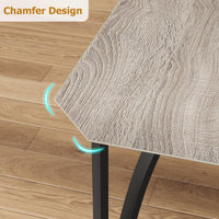 Ensemble table et chaises Garvee pour 4 personnes, design biseauté, coussins d'assise en polyuréthane, structure en MDF et acier, compact et robuste, idéal pour les petits espaces, noir.