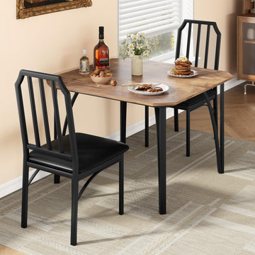 Ensemble table et chaises Garvee pour 2 personnes, design biseauté, chaises rembourrées en PU, structure en MDF et acier, compact, idéal pour les petits espaces, 111 x 70 x 78 cm, noir