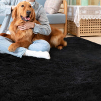 Tapis moelleux Garvee 4 cm en polyester peluche noir pour salon et chambre d'enfant. Extra doux et antidérapant.
