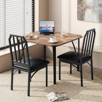 Ensemble table et chaises Garvee pour 2 personnes, design biseauté, chaises rembourrées en PU, structure en MDF et acier, compact, idéal pour les petits espaces, 111 x 70 x 78 cm, noir