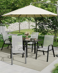 Ensemble de 4 chaises de jardin empilables Garvee avec structure en métal et revêtement en textilène, noires, gain de place, pour terrasse et jardin.