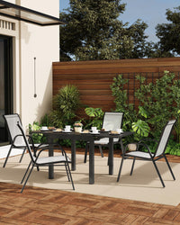 Ensemble de 4 chaises de jardin empilables Garvee avec structure en métal et revêtement en textilène, noires, gain de place, pour terrasse et jardin.