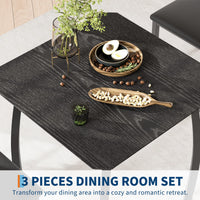 Ensemble de salle à manger Garvee 3 pièces pour 2 personnes, compact et robuste, table en MDF, chaises rembourrées en PU, structure en métal, noir, idéal pour les petites cuisines et les appartements.