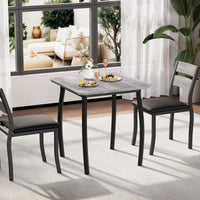 Ensemble de salle à manger Garvee 3 pièces pour 2 personnes avec chaises rembourrées en PU et table en bois MDF, compact, robuste, gris, idéal pour les petites cuisines et les appartements.