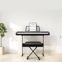 Garvee Piano clavier pour enfants, 61 touches, avec sac, microphone et casque, idéal pour les débutants, portable et utilisable à la maison, noir.